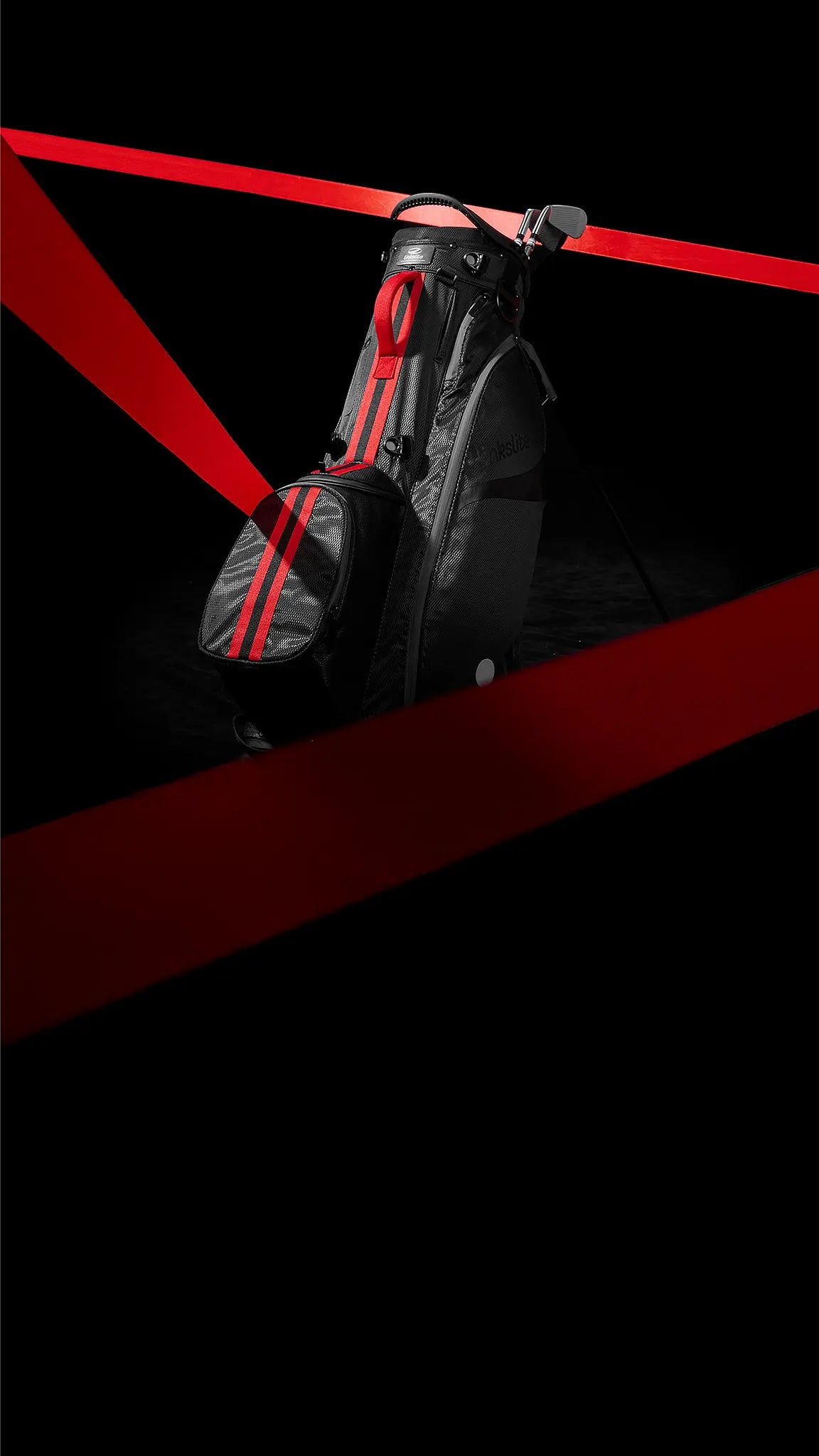Linkslite The Explorer black golf stand bag with red accents displayed in a hero banner on a black background.