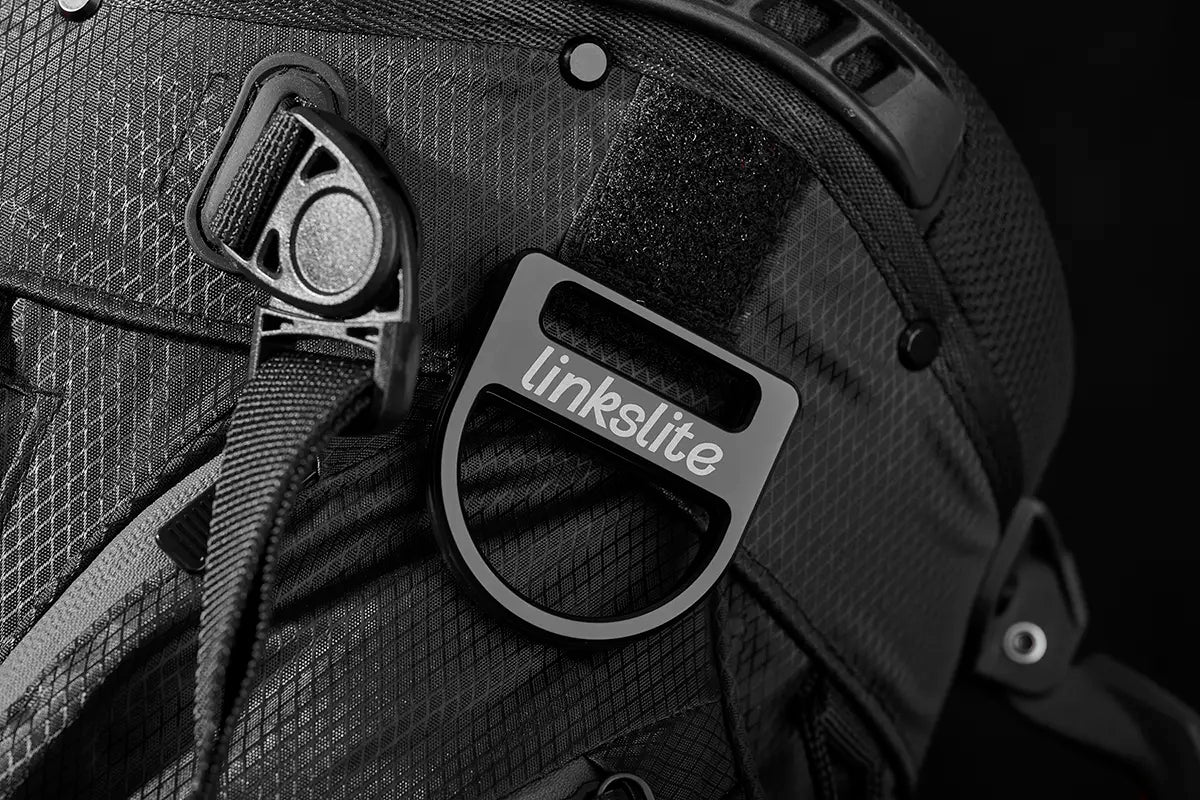Close-up of the Linkslite towel ring on The Explorer black golf stand bag, featuring durable fabric and premium material.