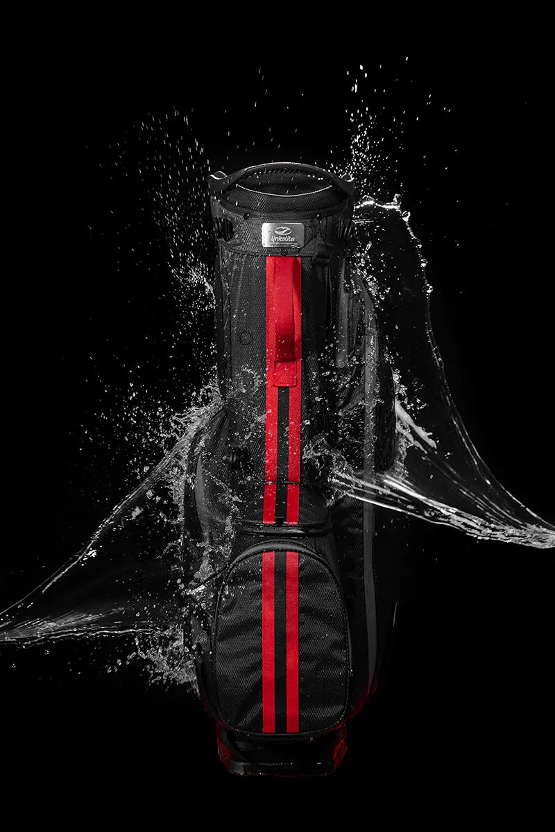 Showcasing The Explorer stand bag's waterproof design by splashing water on the water-resistant surface.